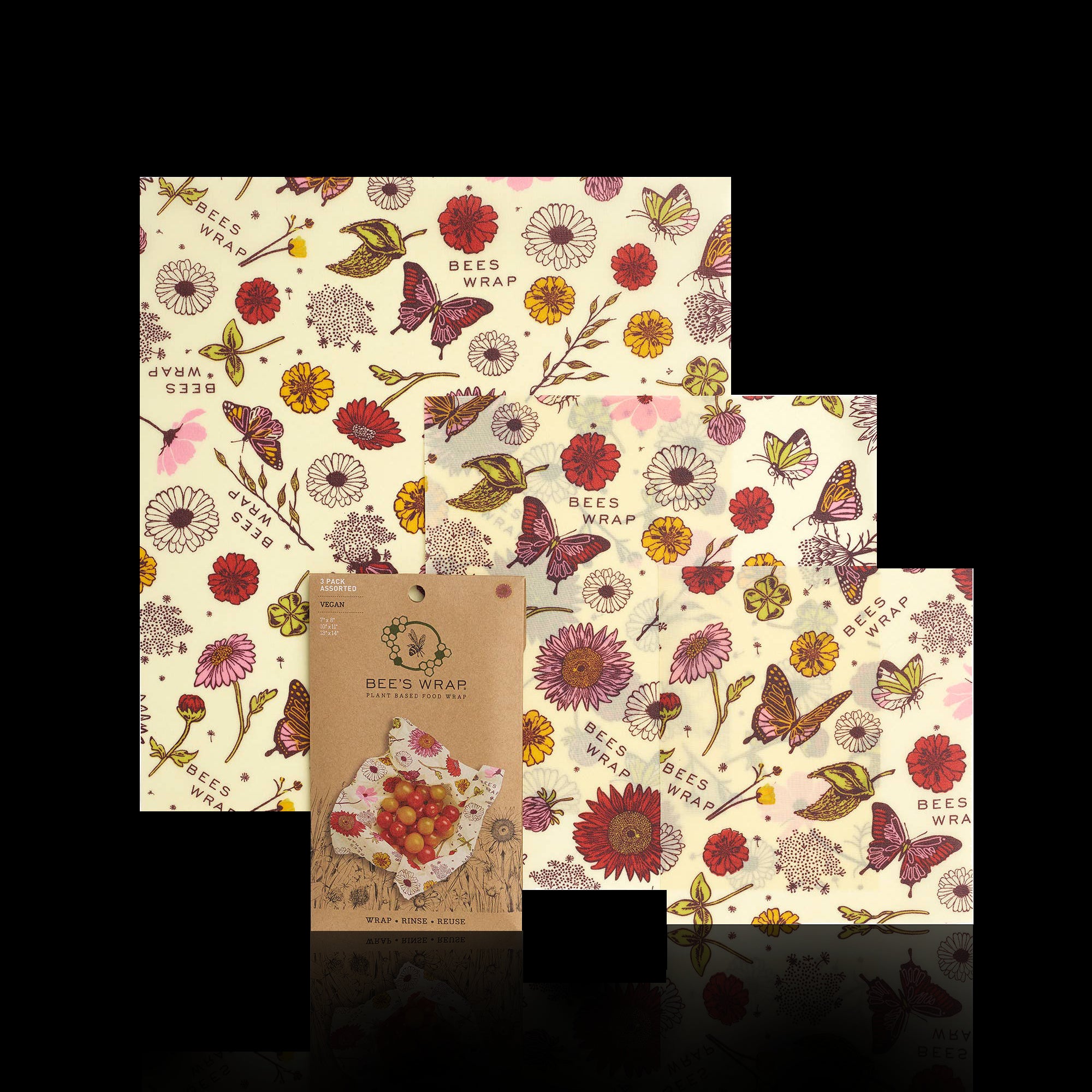 Accessories & Crocks - Assorted 3 Pack - Meadow Magic, Plant Based Wax for wrapping food. Image is beige or yellow with butterflies and flowers and three sizes of wrap on a black background.